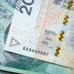 20 banknote on green textile